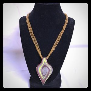 Bead chain with glass colored pendant